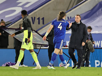 Manager of Leicester City Brendan Rodgers (far right) interacts with Caglar Soyuncu of Leicester City after the final whistle during the Pre...