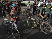 Cyclists demonstrate on Avenida Tláhuac after the collapse of Metro line 12 on the night of May 3 between Tezonco and Olivos stations in Mex...