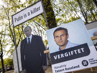 People protest in support of Kremlin critic Alexei Navalny against Russian President Vladimir Putin in Berlin, Germany on May 8, 2021. (