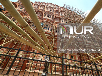 Labourers carry out the restoration work of historical Hawa Mahal in Jaipur,Rajasthan, India, Saturday, May 8, 2021.(