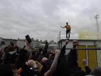 Cambridge United fans celebrating their promotion to league One outside the R Costings Abbey Stadium, Cambridge on Saturday 8th May 2021.  (