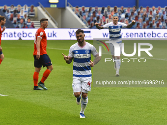 Charlie Austin of QPR celebrates after scoring his team's first goal during the Sky Bet Championship match between Queens Park Rangers and L...