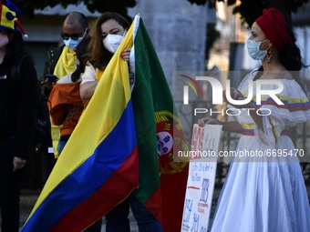 Demonstrators hold banners in rejection of the violence in Colombia during the rally in Luis de Camões Square, Lisbon. 08 May 2021. Colombia...