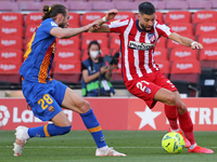 Yannick Carrasco and Oscar Mingueza during the match between FC Barcelona and Club Atletico Madrid, corresponding to the week 35 of the Liga...