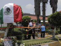 Offering installed in the emergency zone where on Monday night, May 3, a column collapsed between the Tezonco and Olivos stations in Mexico...