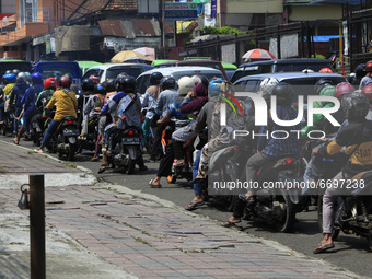 A view of a traffic jam during the Muslim holy month of Ramadan amid the COVID-19 coronavirus pandemic in Bogor, Indonesia on May 9, 2021. A...