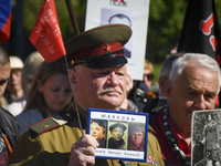 Man with Soviet army uniform  marching on the streets of Sofia during so-called Immortal Regiment procession - celebration of Victory Day, t...