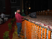  Worker decorate a Auditorium  for  oath taking ceremony of Chief Minister and other ministers of Assam, at Srimanta Sankardeva Internationa...