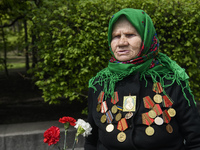 Elderly woman  near the Tomb of the Unknown Soldier as she marks the Victory Day, the 76th anniversary of the victory over Nazi Germany in W...