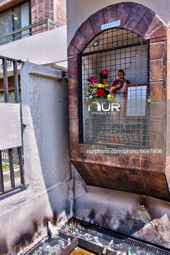 Small shrine to Saint Expeditus outside a church in Santiago, Chile. 