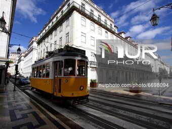 A tram makes a route through the streets of the Baixa district, Lisbon. 07 May 2021. Portugal added, in the last 24 hours, more than 406 new...