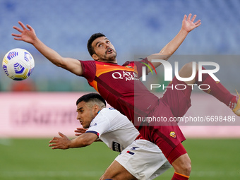 Pedro of AS Roma and Adam Ounas of FC Crotone compete for the ball during the Serie A match between AS Roma and FC Crotone at Stadio Olimpic...