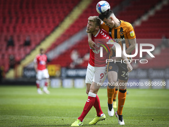  Jaydn Stockley of Charlton Athletic and Jacob Greaves of Hull City compete for the ball  during the Sky Bet League 1 match between Charlton...
