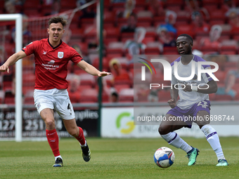  Ryan Wintle of Crewe Alexandra tussles with Daniel Udoh of Shrewsbury Town during the Sky Bet League 1 match between Crewe Alexandra and Sh...