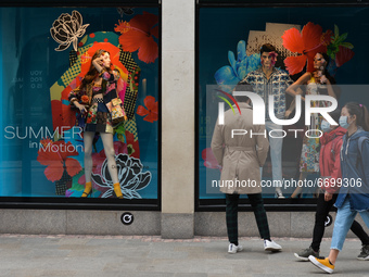 People walk past Dublin's Brown Thomas' new window with the new Dolce and Gabbana summer collection. 
On Sunday, 9 May 2021, in Dublin, Irel...