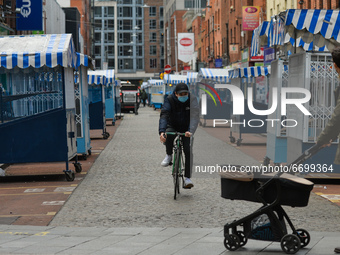 A cyclist wearing a face mask seen in Moore Street in Dublin, during the final days of the level five COVID-19 lockdown. 
On Sunday, 9 May 2...