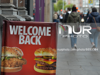Welcome Back sign seen outside a fast food restaurant in Dublin city center. 
On Sunday, 9 May 2021, in Dublin, Ireland. (