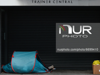 A view of a rough sleeper's tent at the entrance to a closed shop on Henry Street in Dublin city center during the final days of the level f...