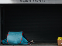 A view of a rough sleeper's tent at the entrance to a closed shop on Henry Street in Dublin city center during the final days of the level f...