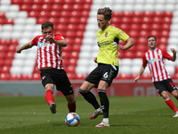  Northampton Town's Fraser Horsfall in action with Charlie Wyke of Sunderland  during the Sky Bet League 1 match between Sunderland and Nort...