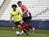  Jordan Jones of Sunderland in action with Shaun McWilliams of Northampton Town  during the Sky Bet League 1 match between Sunderland and No...