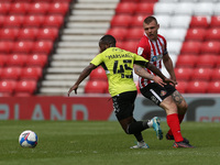  Max Power of Sunderland in action with Northampton Town's Mark Marshall  during the Sky Bet League 1 match between Sunderland and Northampt...