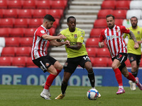  Jordan Jones of Sunderland in action with Mickel Miller of Northampton Town  during the Sky Bet League 1 match between Sunderland and North...