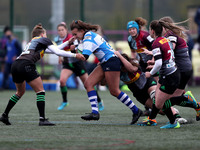        Kenny Thomas of Darlington Mowden Park Sharks and Sarah Beckett and Emily Scott of Harlequins Women during the WOMEN'S ALLIANZ PREMIE...