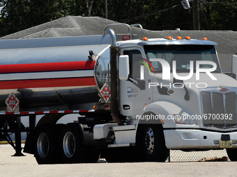 A tanker truck leaves a fuel terminal with a load of gasoline on May 9, 2021 in Orlando, Florida. According to the National Tank Truck Carri...