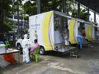 Thai people undergo a proactive mass nasal swab test to contain the rapid spreading of the COVID-19 pandemic, in Bangkok, Thailand, 10 May 2...