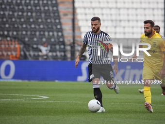 Vieirinha #20 and captain of PAOK and Bruno Gama #16 of Aris during the soccer match between PAOK v Aris for the Play-off of Super League Gr...