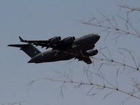 Indian Air Force's cargo plane C-17 Globemaster takes up from the Biju pattnaik International airport at the eastern Indian state Odisha's c...