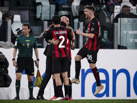 Milan midfielder Brahim Diaz (21) celebrates with Milan coach Stefano Pioli and his teammates after scoring his goal to make it 0-1 during t...