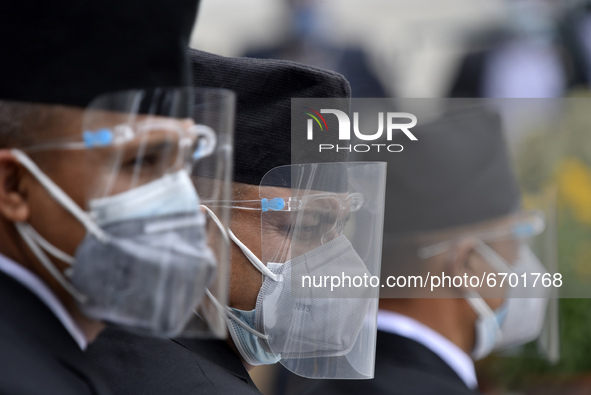 Federal Parliament Staff along with face mask and shield guard around the federal parliament building as Prime Minister KP Sharma Oli will b...