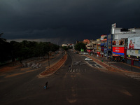 Thunderstorm clouds hovering in the sky before the downpour as eastern indian state odisha's capital city bhubaneswar daily market area road...