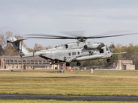 A United States Navy Marine CH53 Sea Stallion Helicopter takes off above an MV-22 aircraft at Leuchars Air Station, Scotland  on Monday 10th...