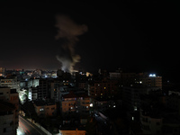Smoke billows from Israeli air strikes in Gaza City, controlled by the Palestinian Hamas movement, on May 12, 2021. (