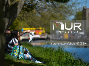 Young people enjoy a sunny weather along the Grand Canal in Dublin.
On Tuesday, 11 May 2021, in Dublin, Ireland. (