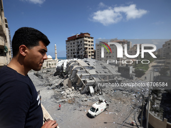 A picture shows a destroyed building in Gaza City, following a series of Israeli airstrikes on the Hamas-controlled Gaza Strip early on May...