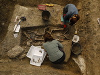 Forensic archaeologists work cleaning and exhuming three bodies found in a common grave on May 12, 2021 in Viznar (Granada), Spain.
An inter...