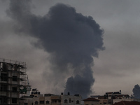 Smoke rises after Israeli air strikes in the east of Gaza City, May 12, 2021.  (