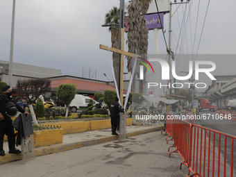 A cross was placed in front of ground zero between the Tezonco and Olivos stations of Line 12 of the Metro Collective Transport System in Me...