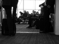 Passengers await to board their next flight at Dallas-Fort Worth International Airport on April 12, 2021. As America’s COVID-19 vaccination...