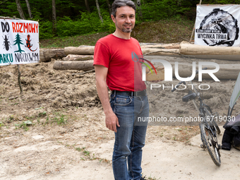 Aljeksjej, a bakery owner, arrived with bread gifts for environmental protesters on May 14, 2021 near Arlamow, Carpathians mountains, south-...