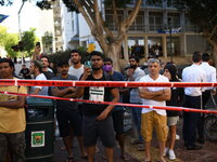 Israelis at the scene of a direct rocket hit, which was fired from the Gaza Strip, in Ramat Gan, causing the death of one Israeli man on May...