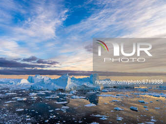 Icebergs near Ilulissat, Greenland. Climate change is having a profound effect in Greenland with glaciers and the Greenland ice cap retreati...