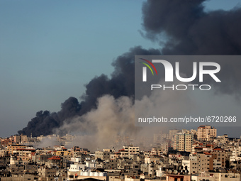 Smoke rises amid a flare-up of Israeli-Palestinian violence, in Gaza May 15, 2021. (