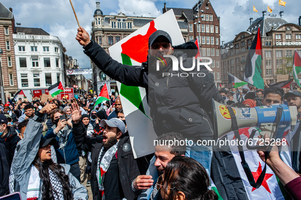 Thousands of Dutch and Palestinians people gathered in the center of Amsterdam to condemn the Israeli attacks and the forced evictions of Pa...