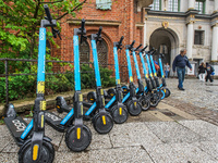 Electric kickscooters belonging to the LOGO SHARING  scooters sharing company parkedin the city center are seen in Gdansk, Poland on 17 May...