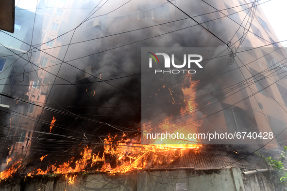 Fire broke out in a building at Kakrail in Dhaka, Bangladesh, on May 21, 2021. According to fire services, the fire broke out at the buildin...